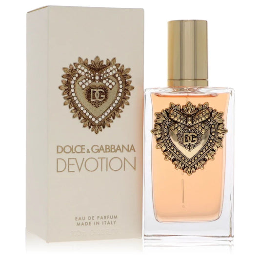 Dolce & Gabbana Devotion – warm gourmand floral perfume in faceted glass bottle with gold sacred heart emblem. 100ml
