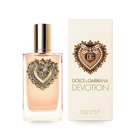 Dolce & Gabbana Devotion – warm gourmand floral perfume in faceted glass bottle with gold sacred heart emblem. 50ml