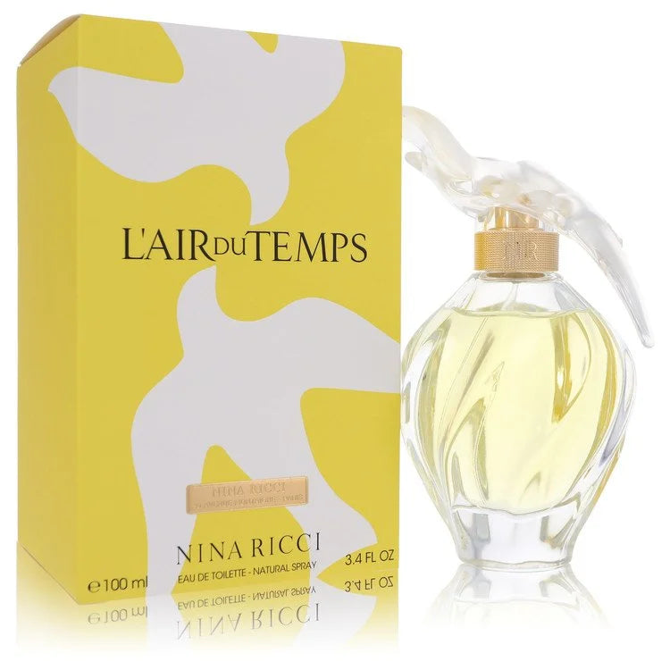 Bottle of L’Air du Temps by Nina Ricci Eau de Toilette with soft floral background and dove cap 100ml