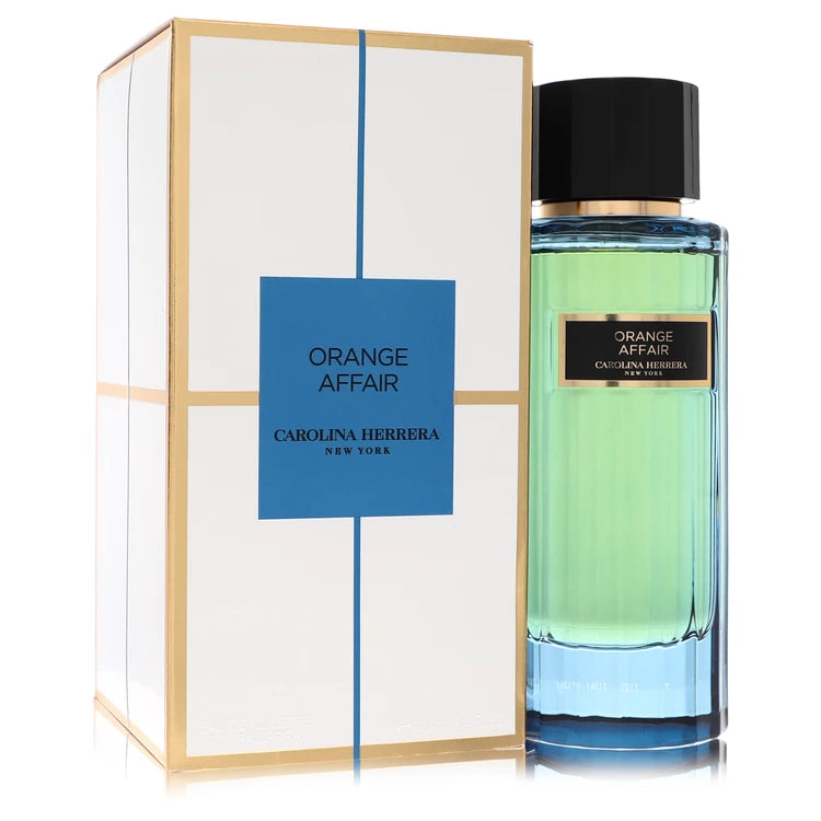Bottle of Carolina Herrera Orange Affair Eau de Parfum with citrus fruits and elegant orange blossoms in a Mediterranean-inspired background 100ml
