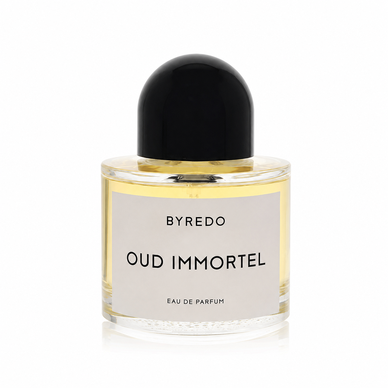 A bottle of Byredo Oud Immortel Eau de Parfum with a black dome-shaped cap, clear glass bottle showing the golden-yellow liquid, and a minimalist white label.