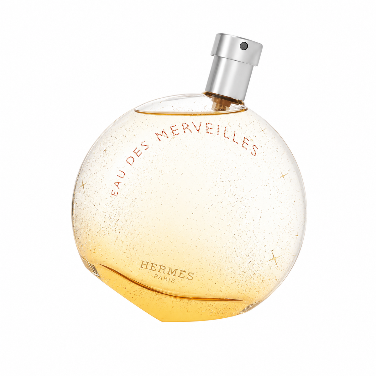 Hermès Eau des Merveilles – sparkling woody amber scent in round orange-tinted bottle with starry detail. 100ml