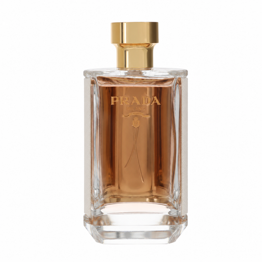 Prada L'Homme Eau de Toilette perfume bottle with a gold cap and gold lettering on a clear glass container, set against a plain white background. 100ml