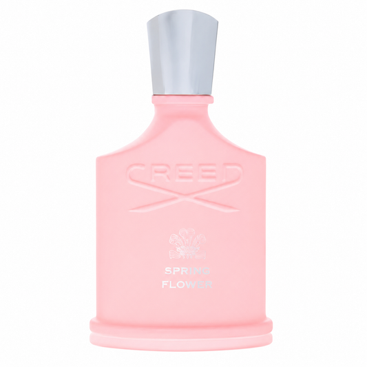 A pink Creed Spring Flower perfume bottle with a silver cap, centered on a plain white background. 75ml