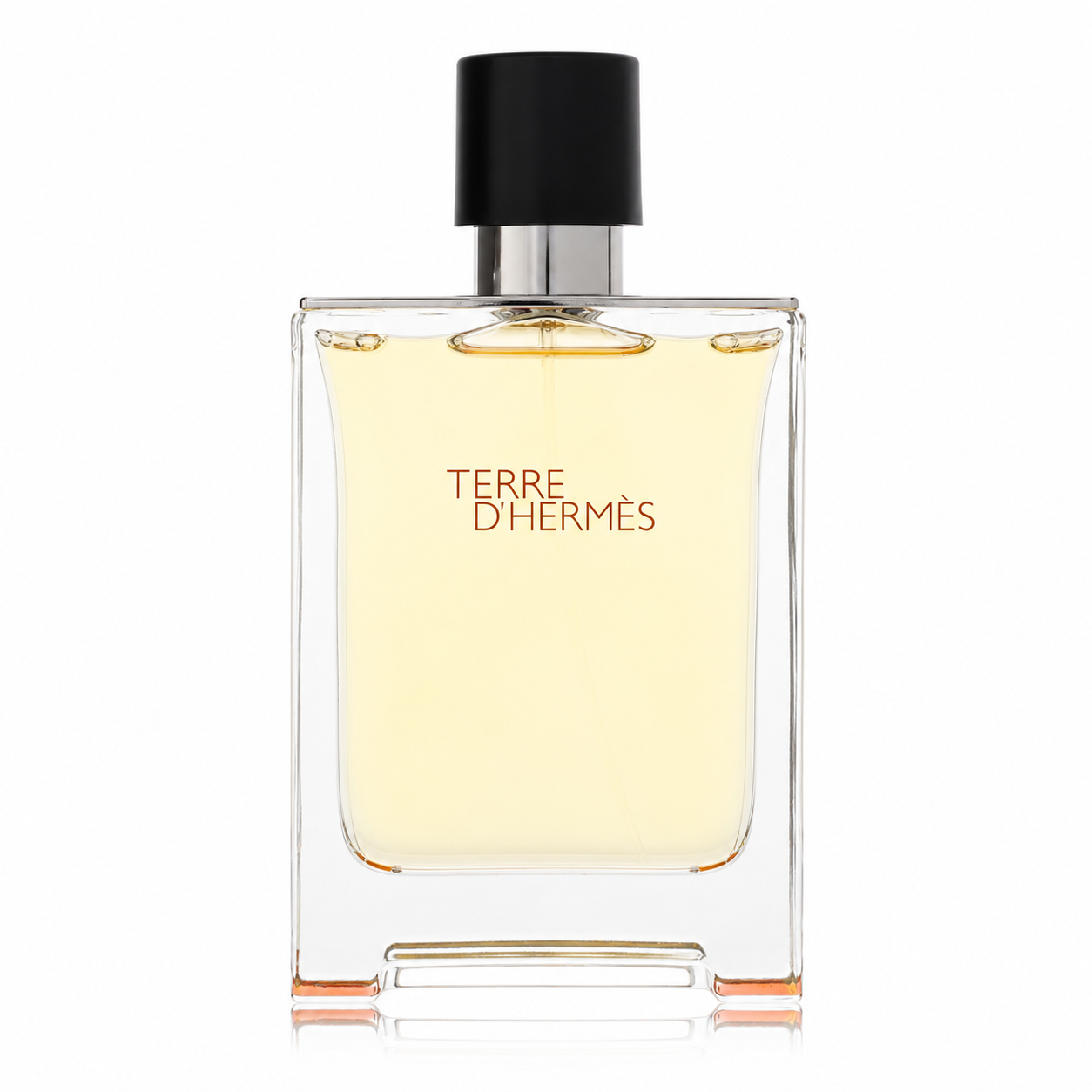 Hermès Terre d’Hermès – iconic woody spicy men’s scent in minimalist clear glass bottle with orange detail. 100ml