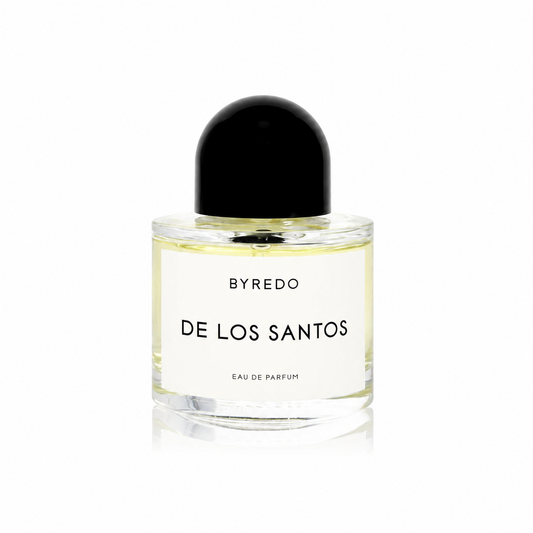A bottle of Byredo De Los Santos Eau de Parfum with a black dome-shaped cap and a white label, set against a clean white background.