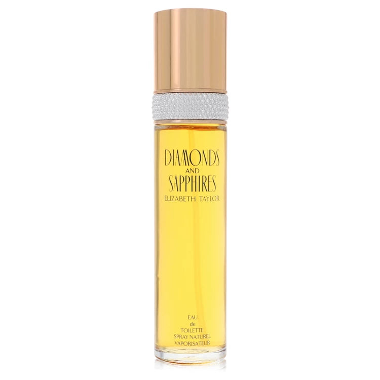Elizabeth Taylor Diamonds and Sapphires Eau de Toilette perfume bottle with a metallic rose gold cap, textured silver band, and yellow liquid inside a clear glass bottle. 100ml