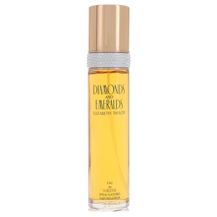 Elizabeth Taylor Diamonds and Emeralds Eau de Toilette spray bottle with a gold cap, clear glass body, and golden-yellow liquid, set against a plain white background. 100ml