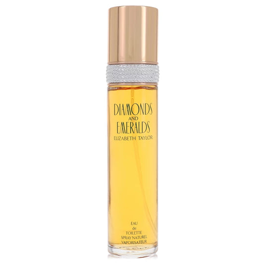 Elizabeth Taylor Diamonds and Emeralds Eau de Toilette spray bottle with a gold cap, clear glass body, and golden-yellow liquid, set against a plain white background. 100ml