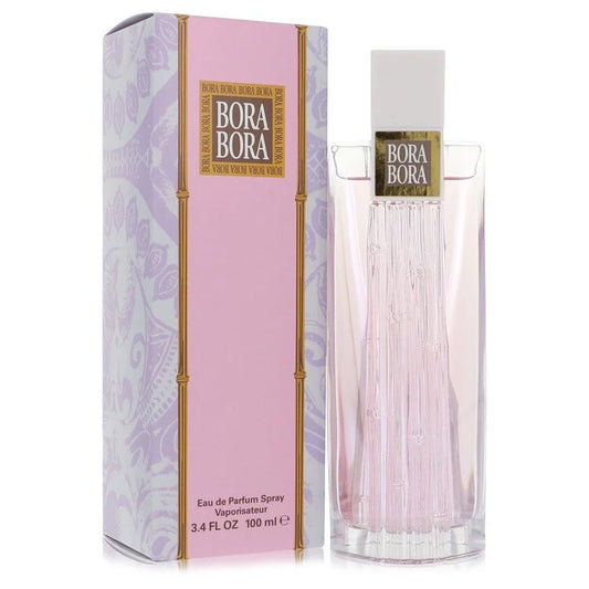 Bottle of Bora Bora for Women Eau de Parfum with tropical flowers and beach-inspired background 100ml