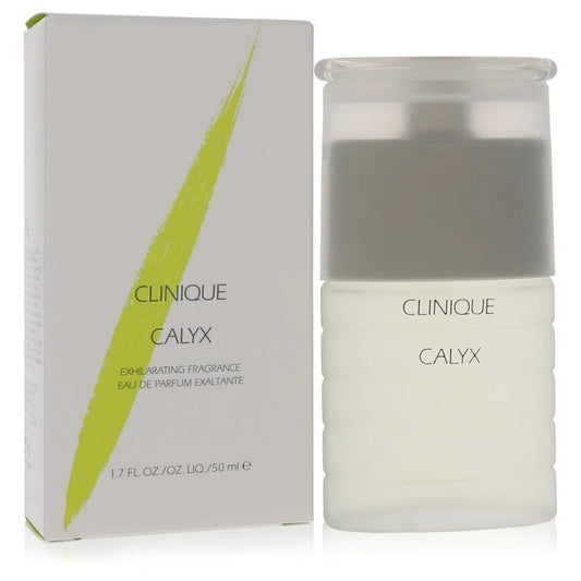 Bottle of Calyx by Clinique Eau de Parfum with citrus fruits and green floral accents in a bright, natural background 50ml
