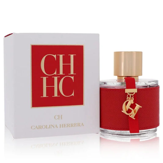 Bottle of Carolina Herrera CH Eau de Toilette for Women with a red ribbon design and soft floral backdrop in a romantic setting 100ml