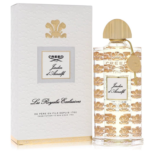 Bottle of Creed Jardin d’Amalfi Eau de Parfum with bright citrus fruits and Amalfi coastal garden background 75ml