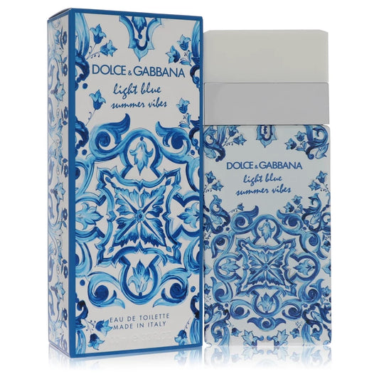 Bottle of Dolce & Gabbana Light Blue Summer Vibes for Women Eau de Toilette 100ml with citrus and peach background

