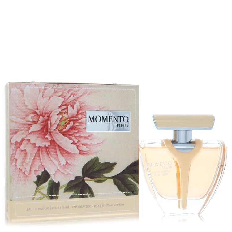 Perfume bottle and packaging with 'Momento Fleur' branding on a white background 100ml