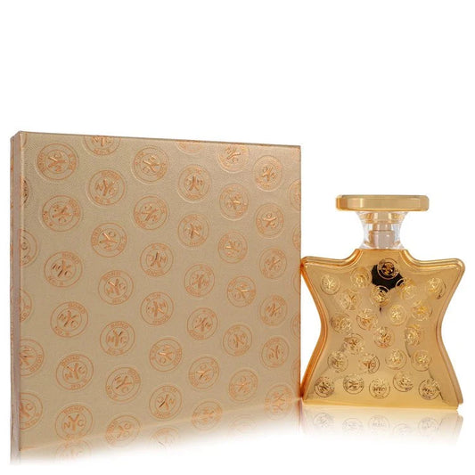 Gold perfume bottle and packaging with intricate design on a white background 100ml