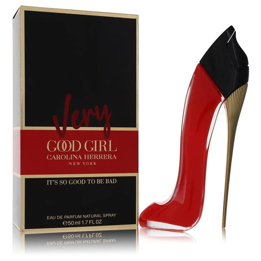 Bottle of Very Good Girl by Carolina Herrera in bold red stiletto design with romantic rose and fruity accents in the background 50ml