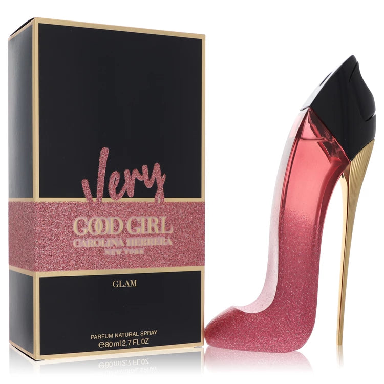 Bottle of Very Good Girl Glam by Carolina Herrera in sparkling red stiletto design with cherry and rose accents in a glamorous setting 80ml