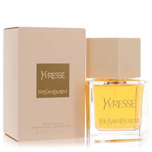 Bottle of Yvresse by Yves Saint Laurent Eau de Toilette with champagne bubbles and golden background 80ml